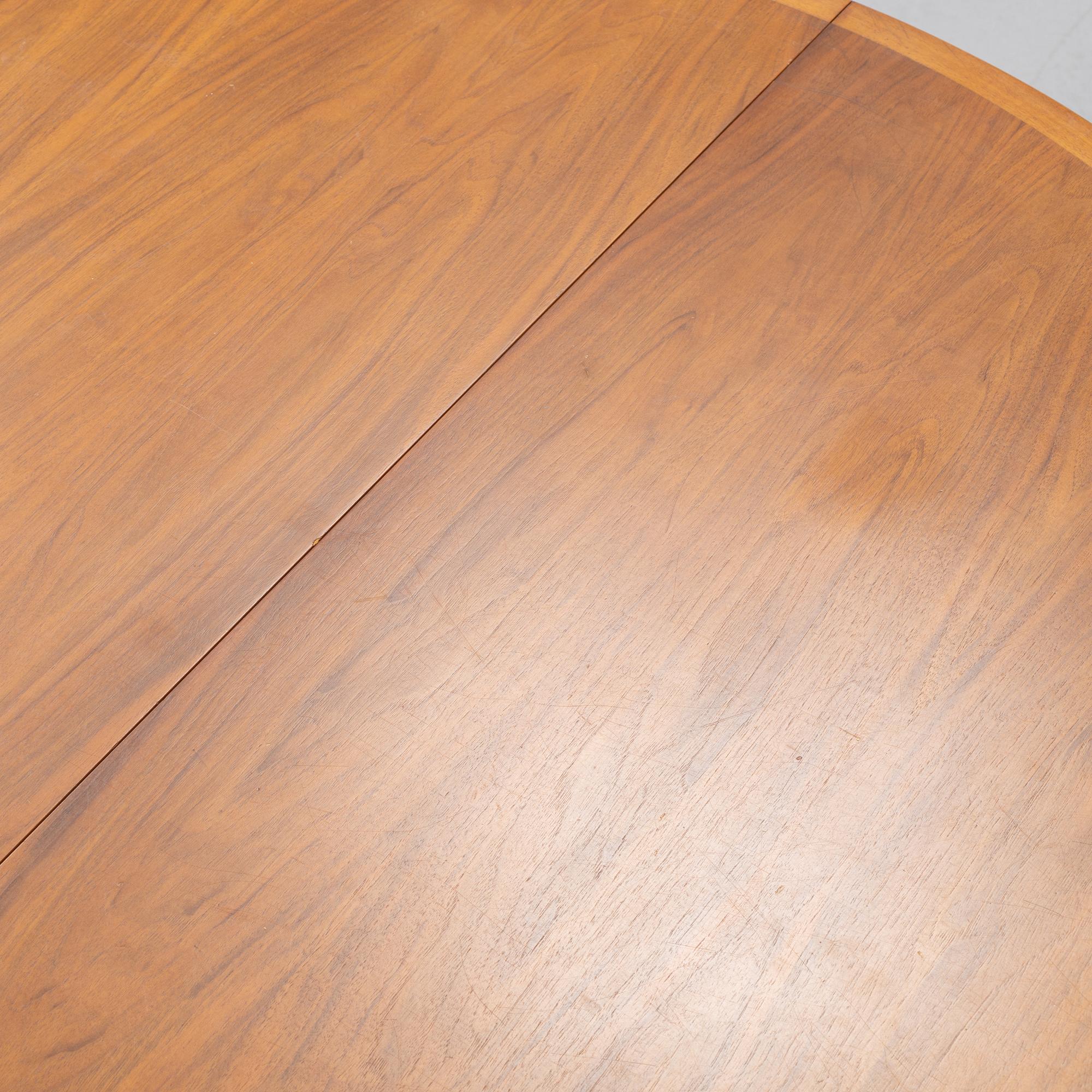 Bertil Fridhagen, a 'Diamant' walnut veneered dining table, with four additional leaves.  Bodafors.