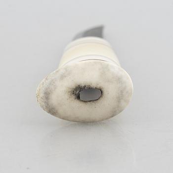 Martin Kuorak, a reindeer horn knife.