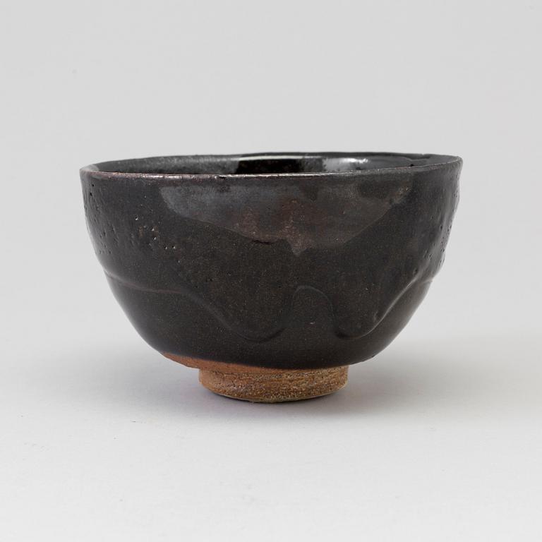 A Japanese Raku stoneware bowl, 20th century.