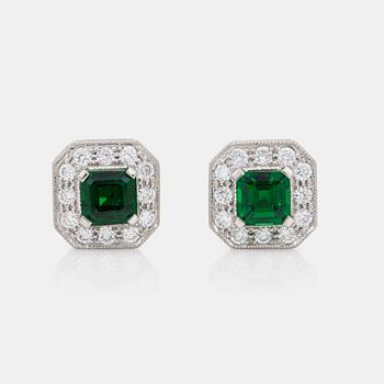1284. A pair of Asscher-cut tsavorite and brilliant-cut diamond earrings.