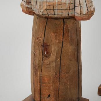 and CARL JOHAN TRYGG, three wooden sculptures, signed and dated, 1940s.