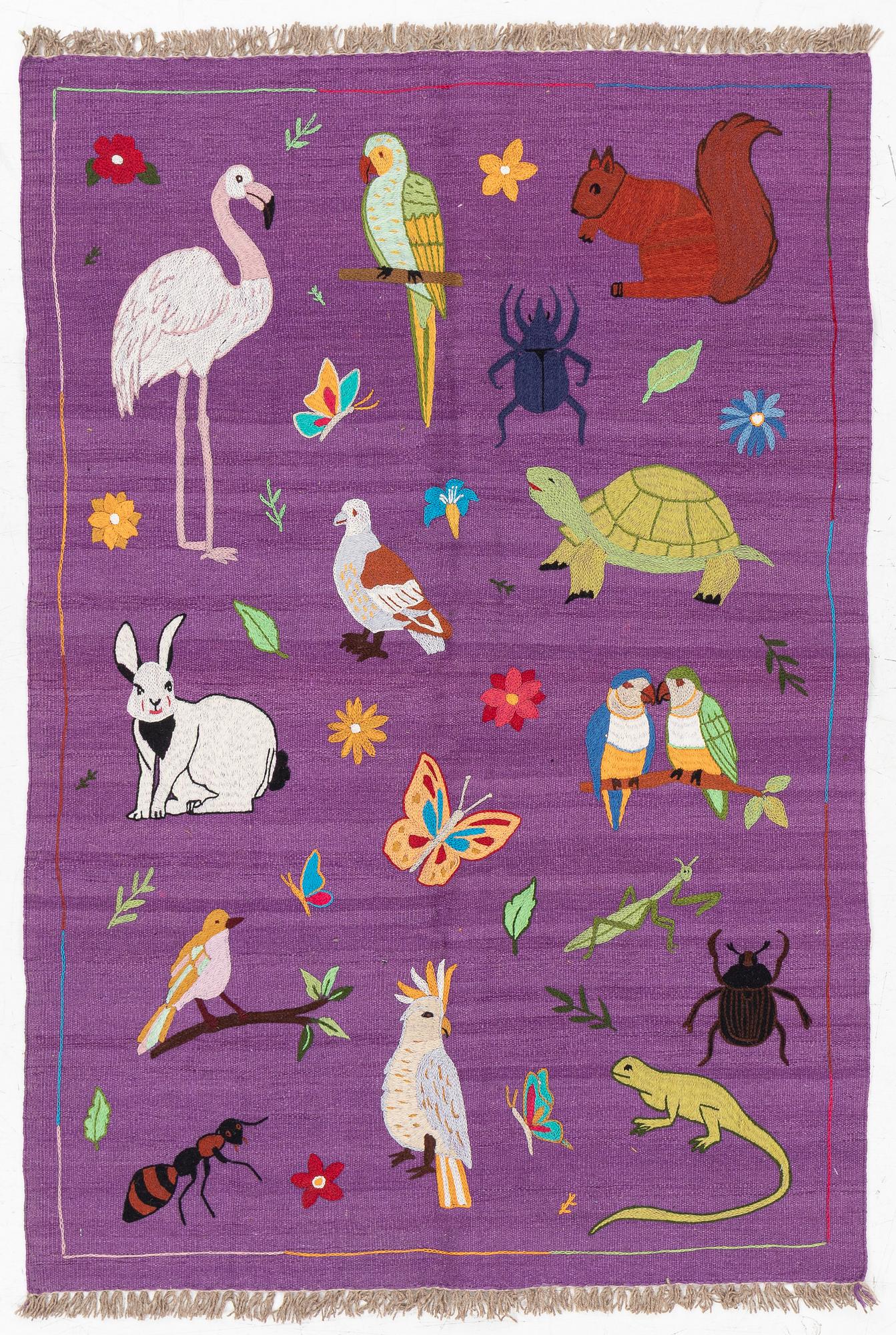 A hand-embroidered Kelim rug, c. 177 x 123 cm.