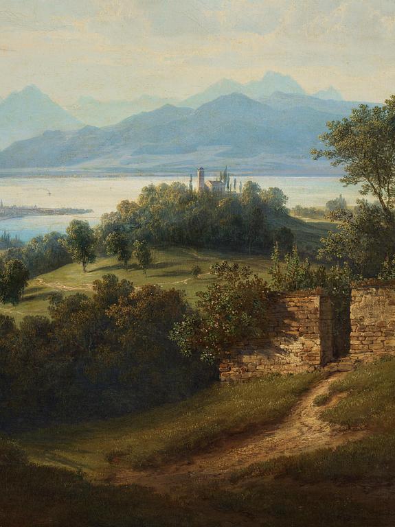 Alplandskap med sjö och slott.