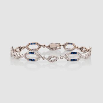 1245. A diamond, 0.87 ct in total, and sapphire, 1.54 cts in total, bracelet.