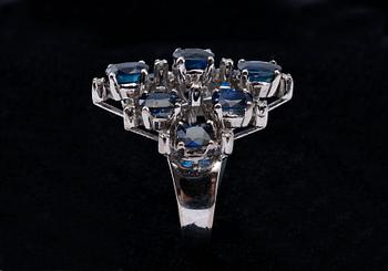 A RING, 8/8 cut diamonds ca 0.11 ct. sapphires ca 5 ct. 18K whitegold. Weight 10,5 g.