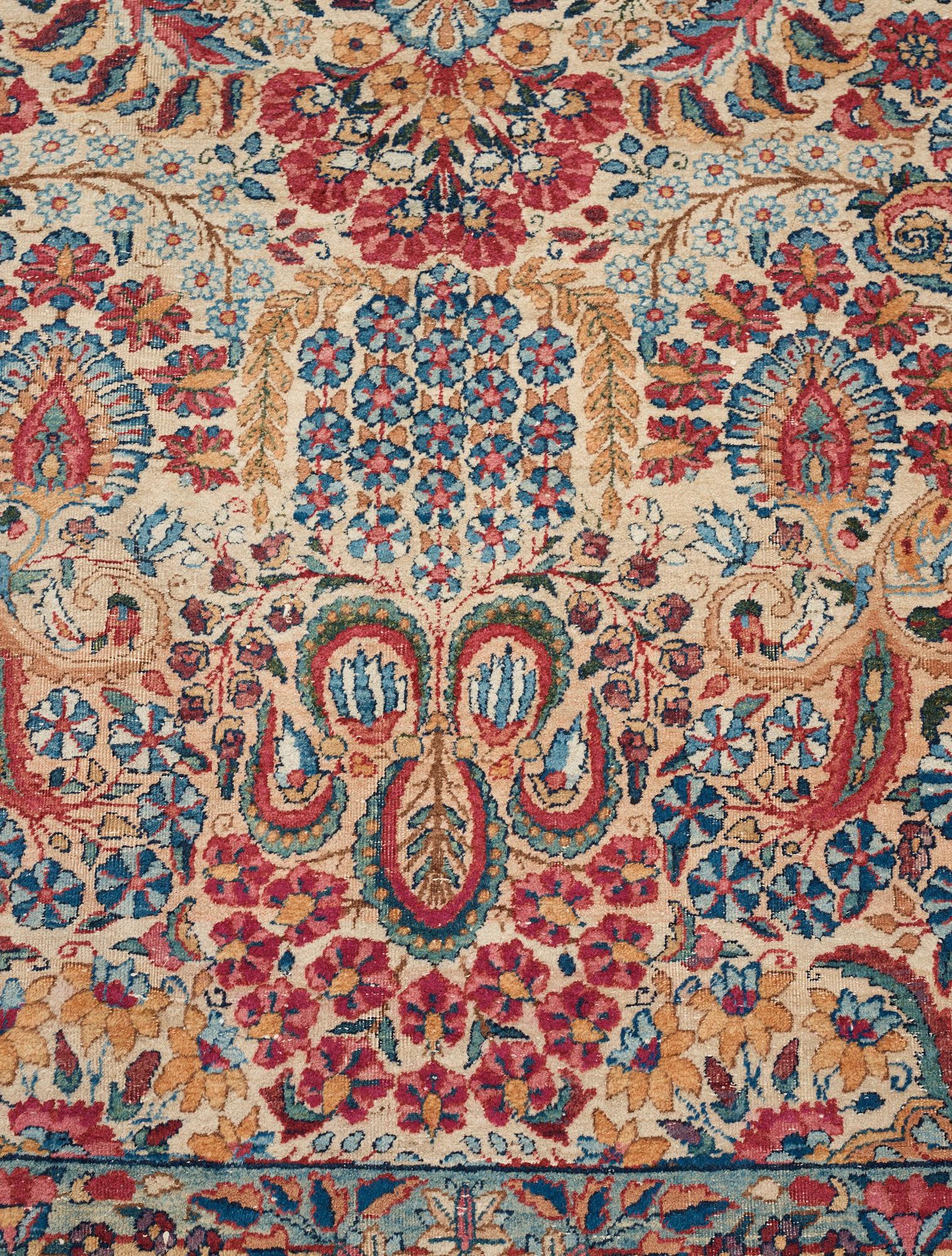 A carpet, a semi-antique Kerman, ca 375-379,5 x 268-271 cm.