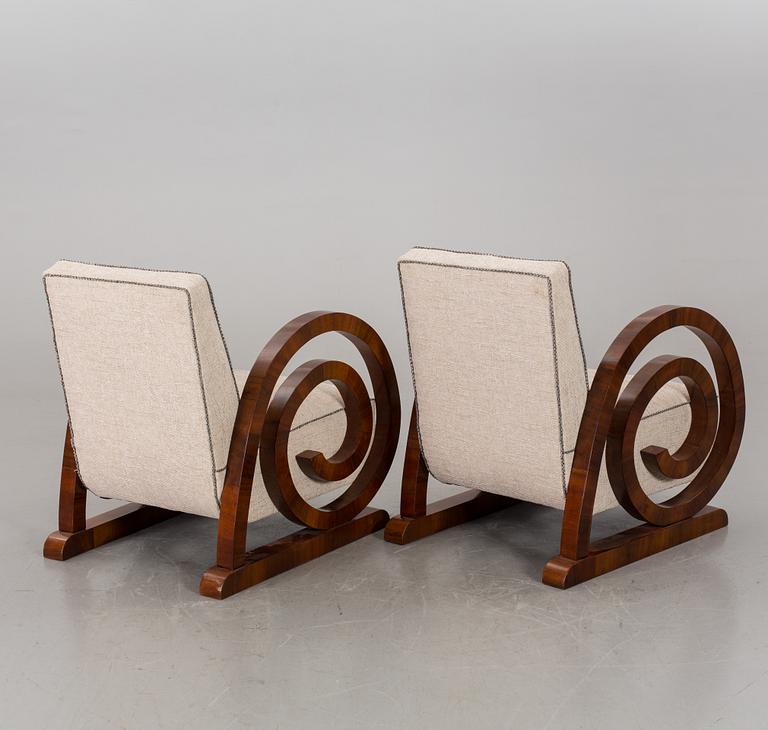 A pair of Art Deco armchairs.