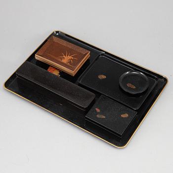 A group of Japanese lacquer trays and boxes, early 20th Century. (10 pieces).