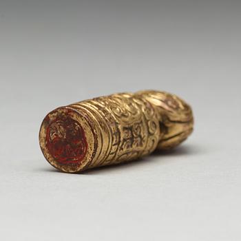 A Tibtean gilt bronze seal, presumably 18th Century.