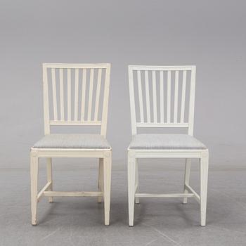 A set of 12 gustavian style chairs from the second half of the 20th century.