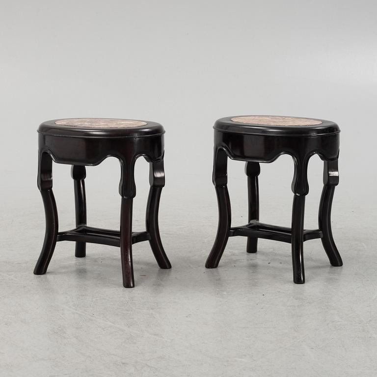 A pair of black-lacquered stools, Japan, around 1900.