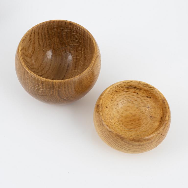 Magnus Ek, a set of seven oak wood bowls for Oaxen Krog, 2019-2020.