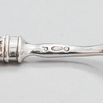 Four pieces of Russian silver cutlery.