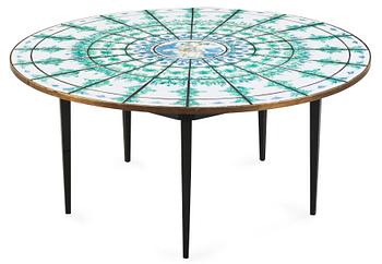 89. A Björn Wiinblad tiled top dining table, Denmark 1974.