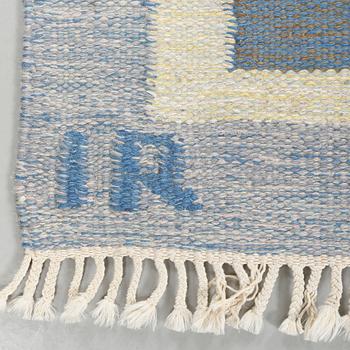 A flat weave carpet designed by Ida Rydelius from the second half of the 20th century.
