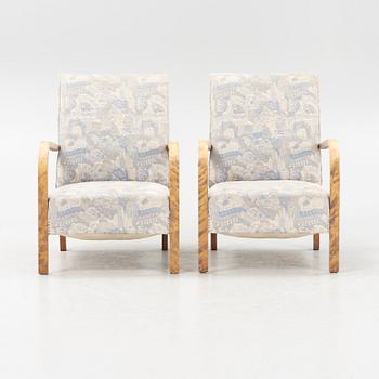 A pair of 1930's armchairs.