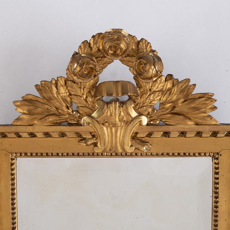 A Gustavian style gilded and bronzed scone, first half of 20th century.