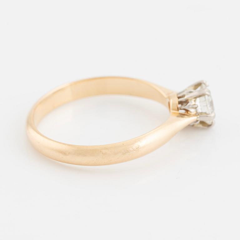 One-stone ring with an old-cut diamond.