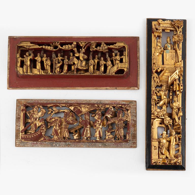 Three wooden panels, China, late Qing dynasty and early 20th century.