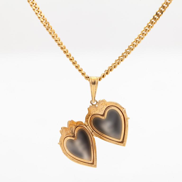 A heart pendant/medallion, 18K gold with a 14K gold chain.