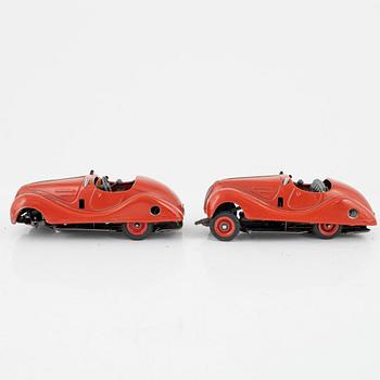 A set of five toy cars, mostly Schuco, Germany.