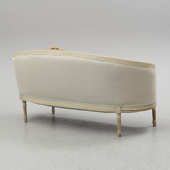 A sofa, four chairs and a table, gustavian style, early 20th century.