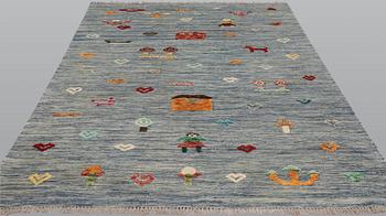 A Kelim carpet, figural, c. 236 x 171 cm.
