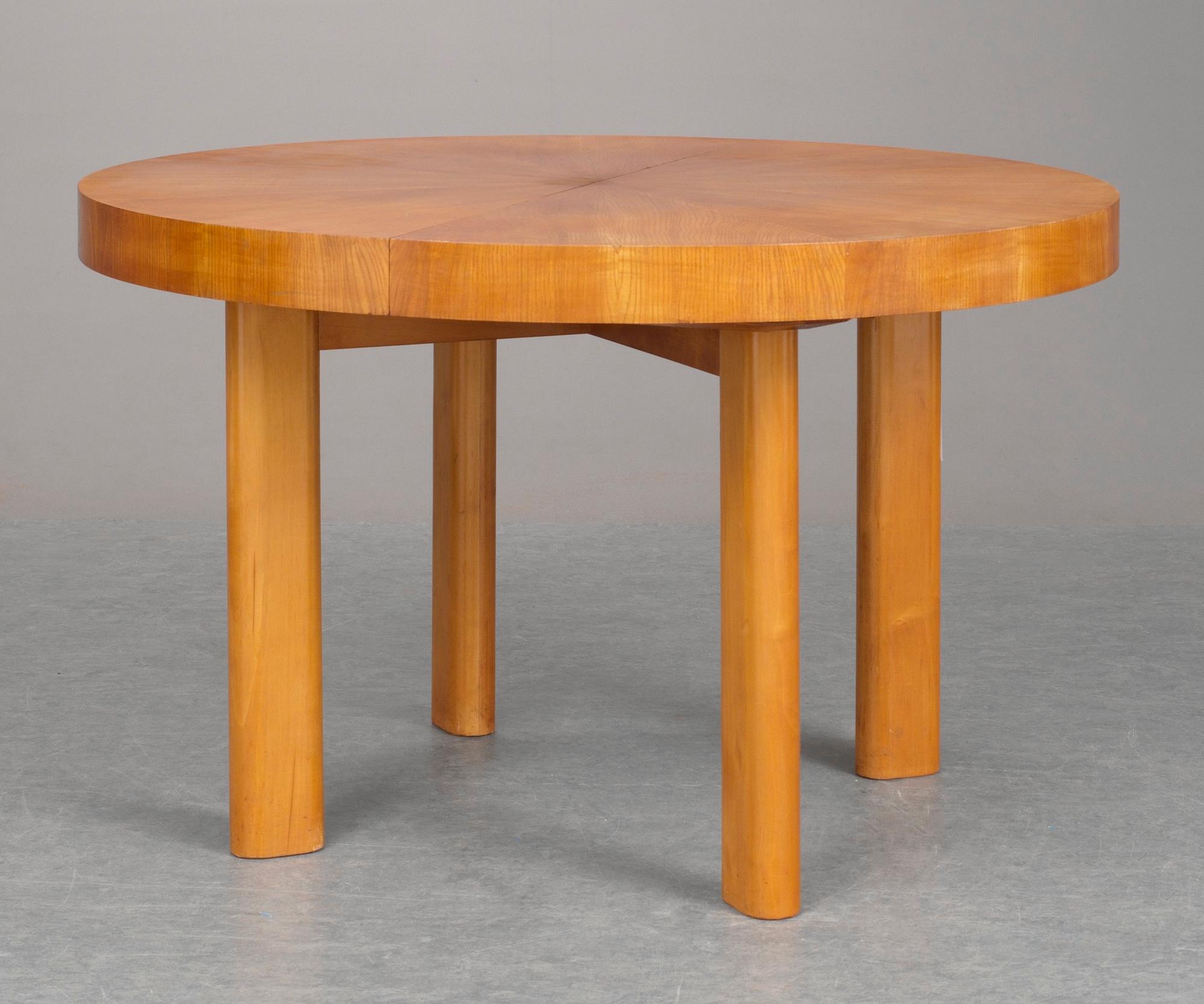 An Axel Einar Hjorth dinner table with 6 chairs "Birka" in ashe wood, by Nordiska Kompaniet, 1930's.