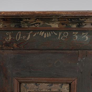 A Swedish provincial wall hanging cabinet, 1833.