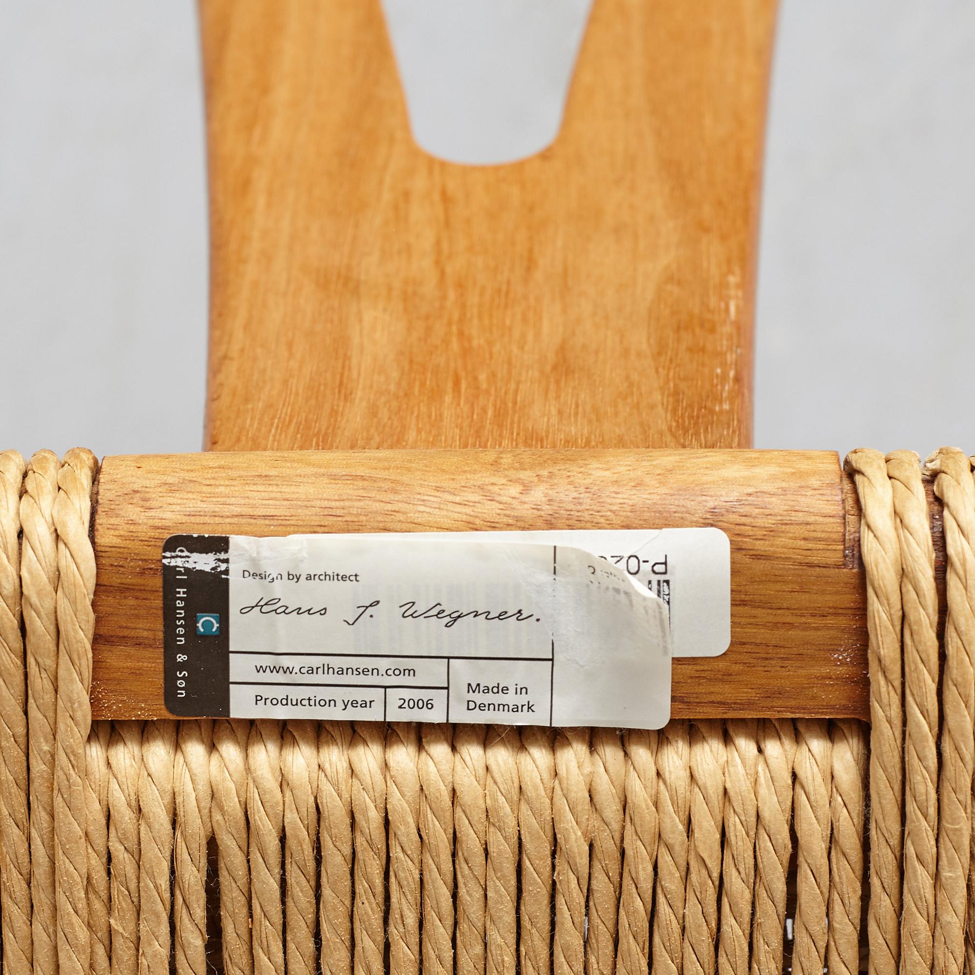 A set of four + two armchairs 'Y-chair' by Hans J Wegner, Carl Hansen & Son, Denmark.