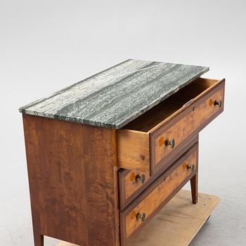A mahogany and birch veneered dresser with a stone top.