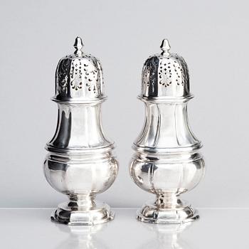 A pair of Swedish silver sugar shakers, mark of Conrad Gadd, Kristianstad 1744 and Johan Bergengren, Kristianstad 1754.