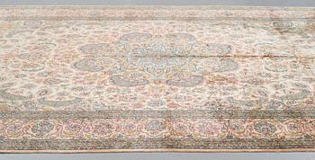 A CARPET, an old silk Turkey, ca 428 x 299-307 cm.