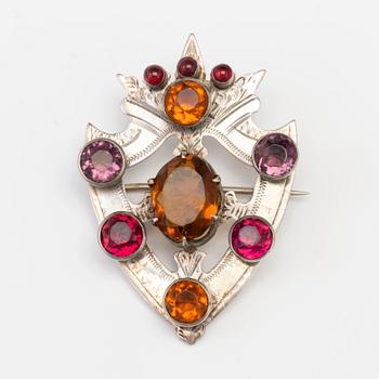 A SCOTTISH BROOCH set with paste.