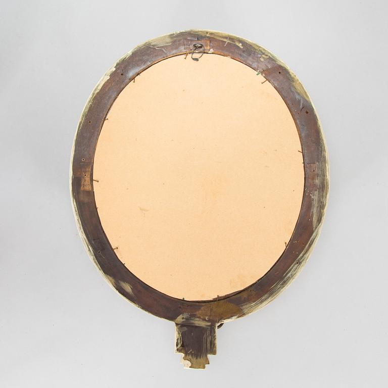 A 20th century, Gustavian style mirror sconce.