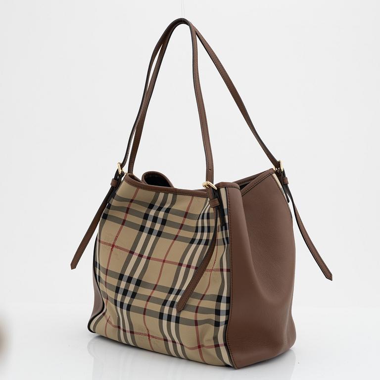 Burberry, a Nova Check canvas and calf leather handbag.