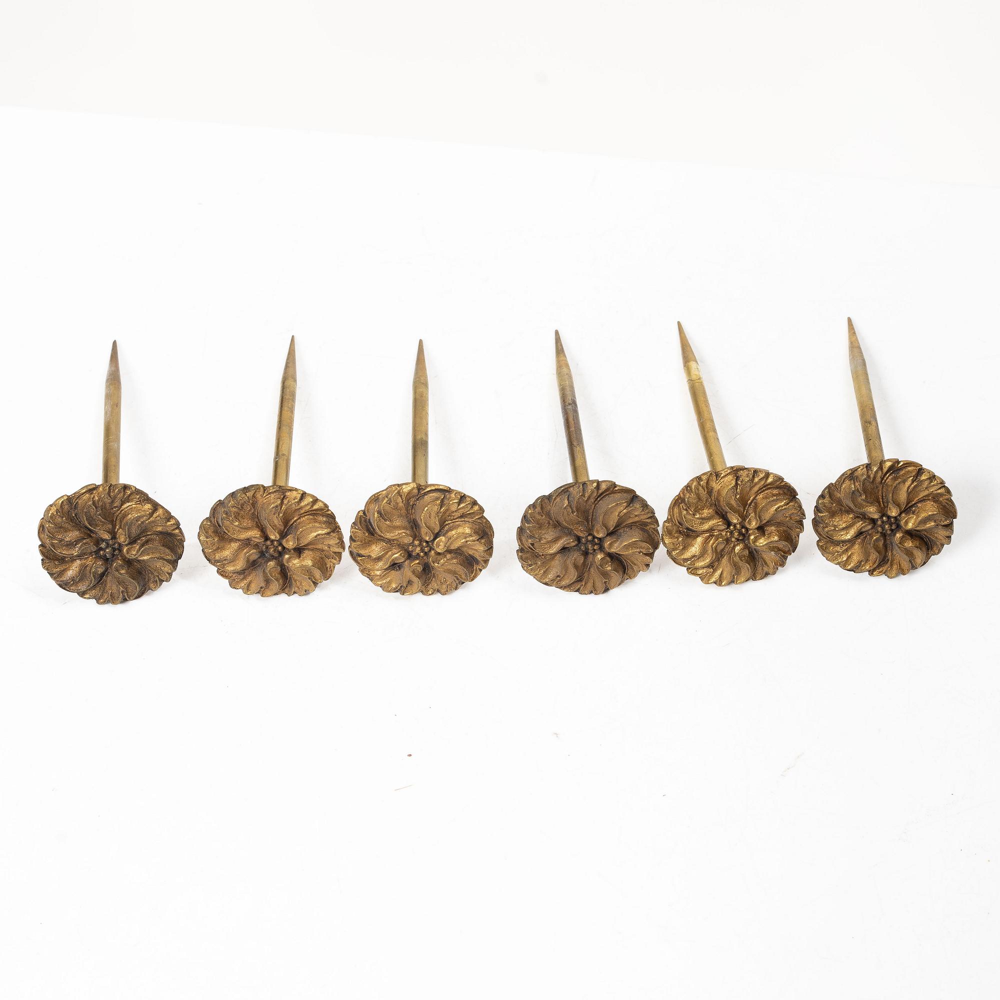 Twelve curtain tiebacks, 19th Century.