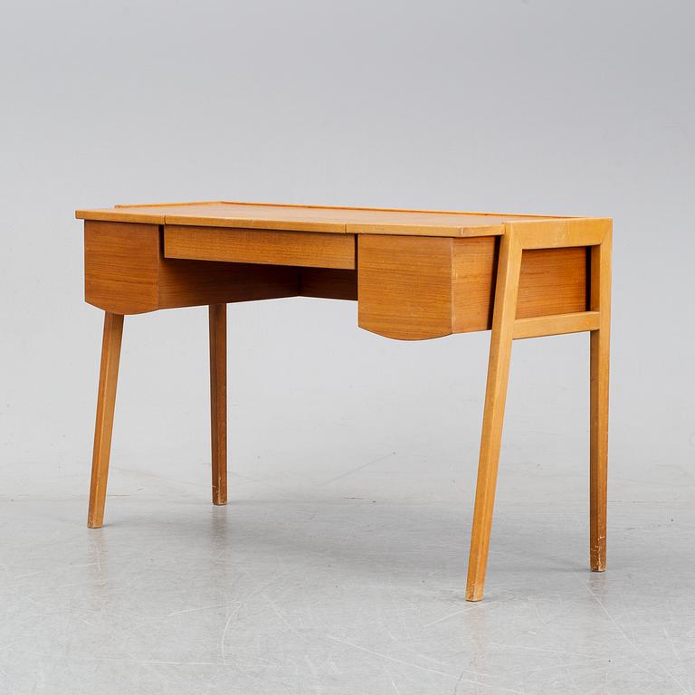A 1960's teak dressing table.