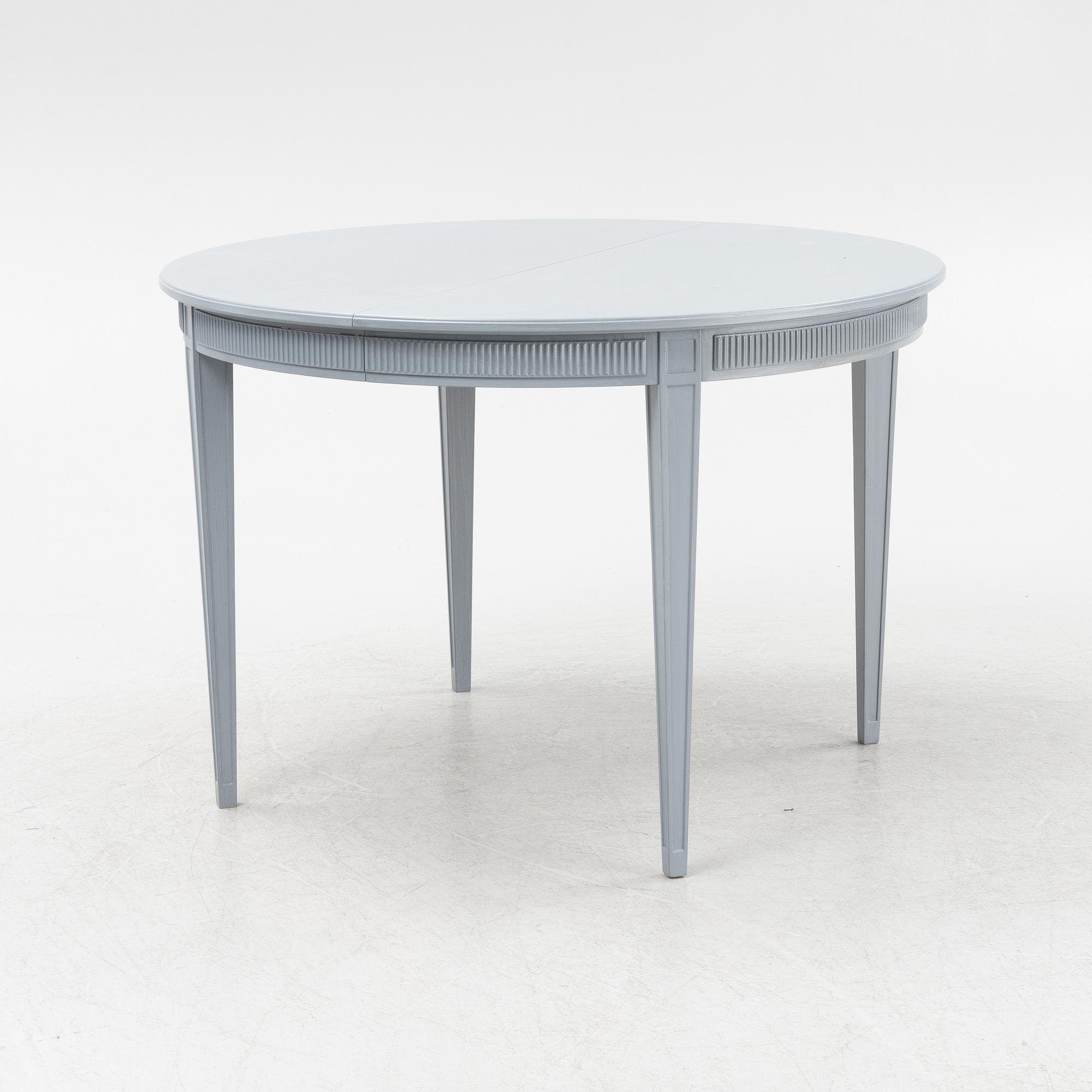 A gustavian style painted dining table, second half of the 20th century.