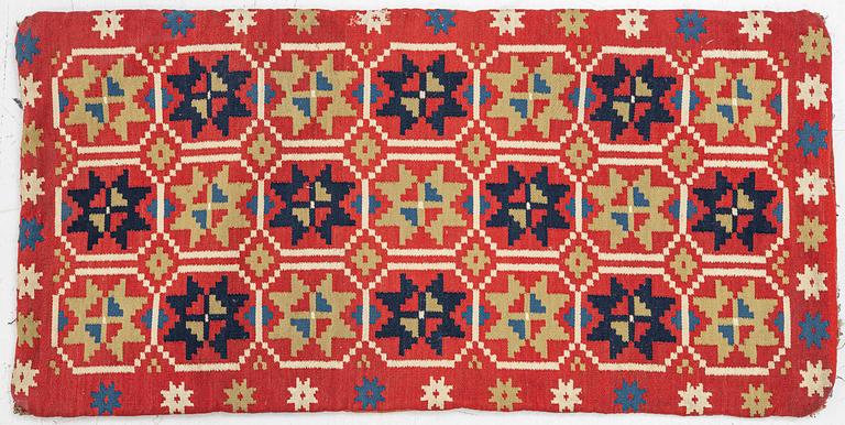 Sled cushion, Rölakan, southwestern Skåne, early 19th century, 110 x 55 cm.
