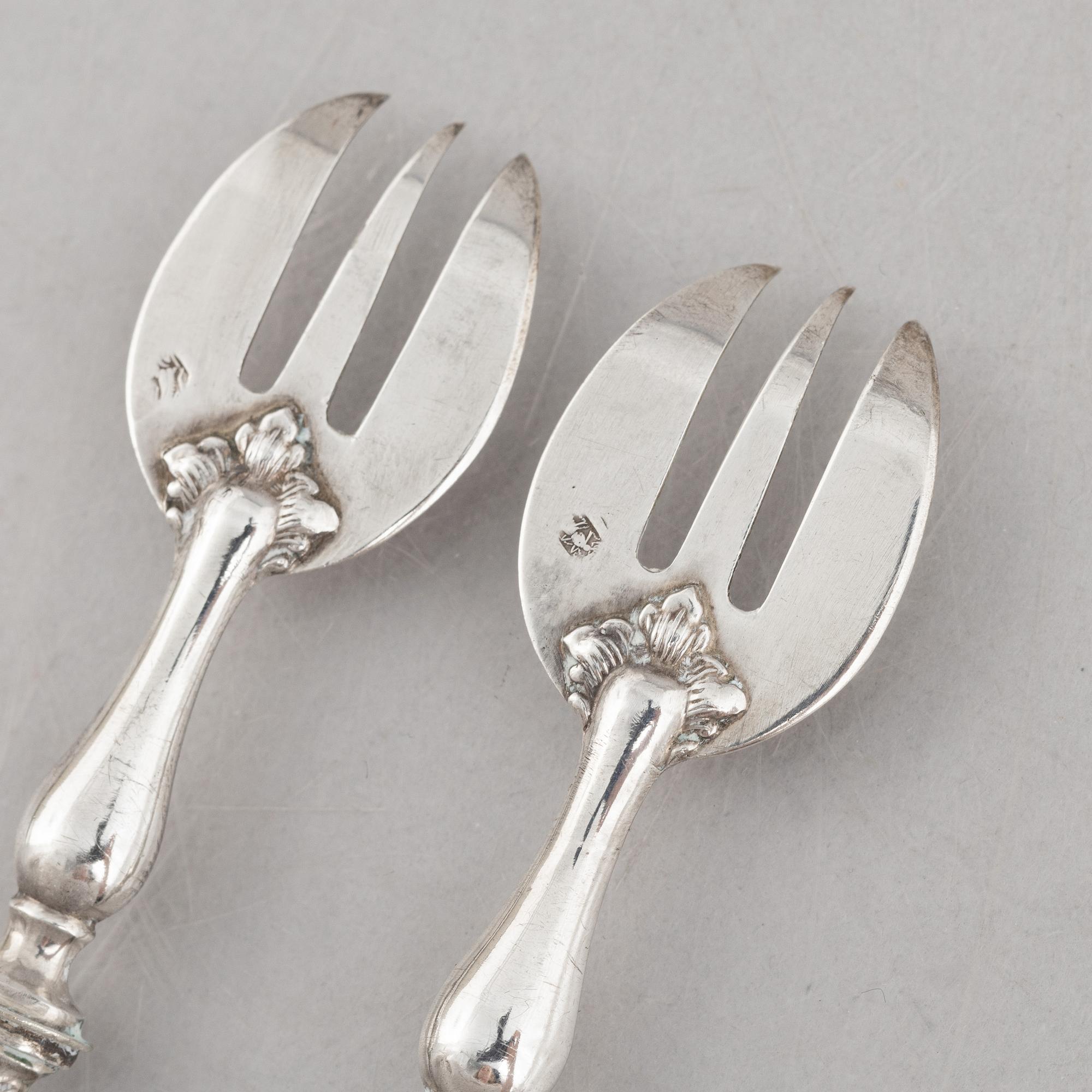 A set of twelve French silver oyster forks, mark of Louis Coignet