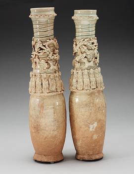 A set of two green glazed vases with covers, Yuan dynasty (1271-1368).