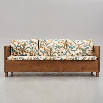 Axel Einar Hjorth, a stained pine sofa "Sport", Nordiska Kompaniet, Sweden 1930's.