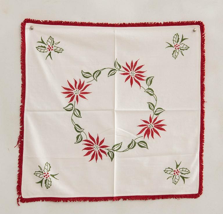 A collection of Christmas tablecloths 12 pcs first half/mid 20th century.