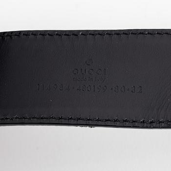 Gucci, a leather and textile belt, size 80.