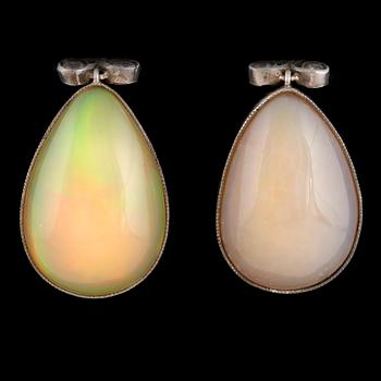 A pair of opal earrings set with old-cut diamonds.