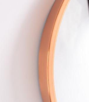 A copper ceiling lamp, by Fog & Mørup, Denmark, and a copper mirror, Markaryd.