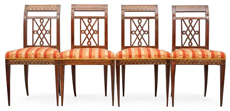 A SET OF FOUR CHAIRS.