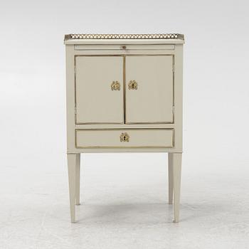 A Gustavian style bedside table, first half of the 20th Century.