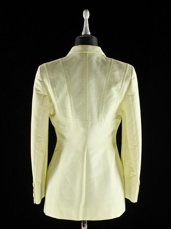 A lime-green cotton suit by Gucci.